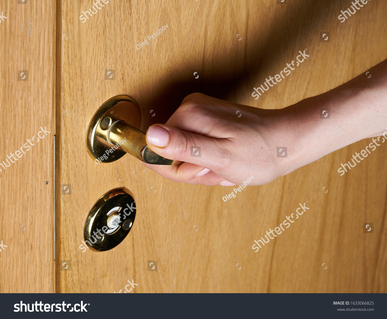 The person opens an interroom door #1633066825