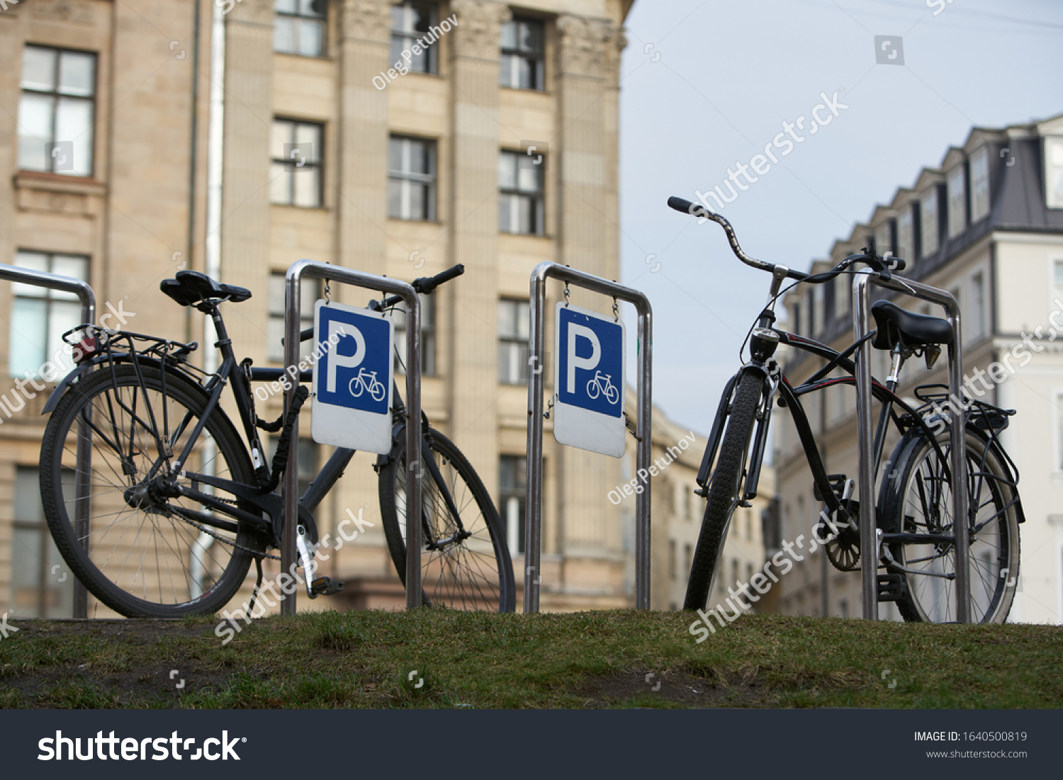 Bicycle secured on a parking in a city. #1640500819