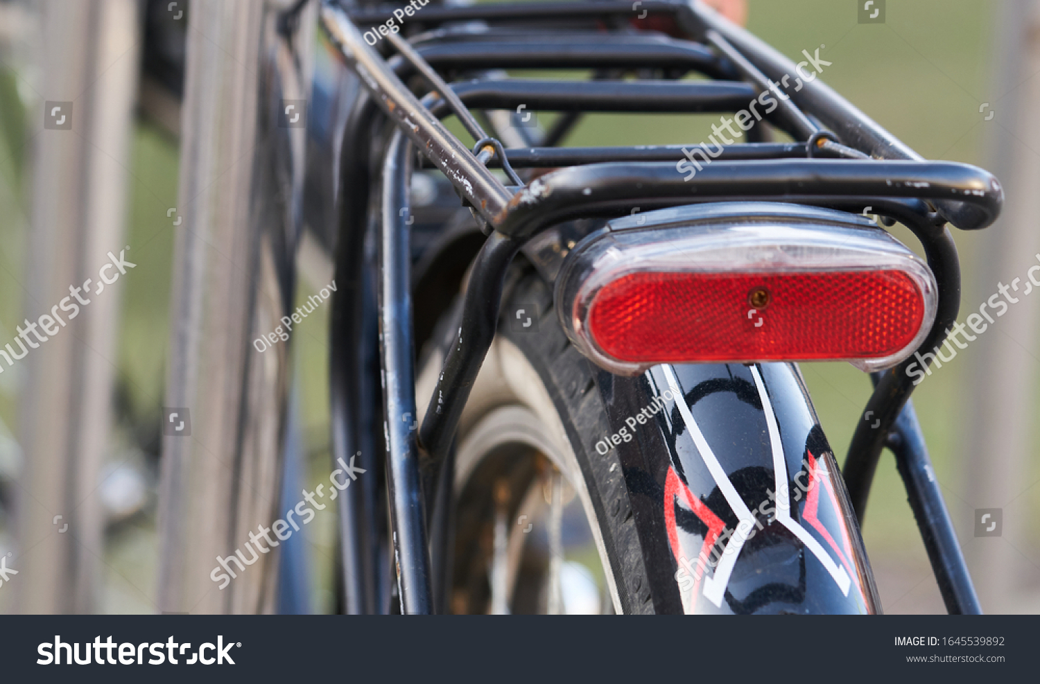 Rear view of bicycle on parking. #1645539892