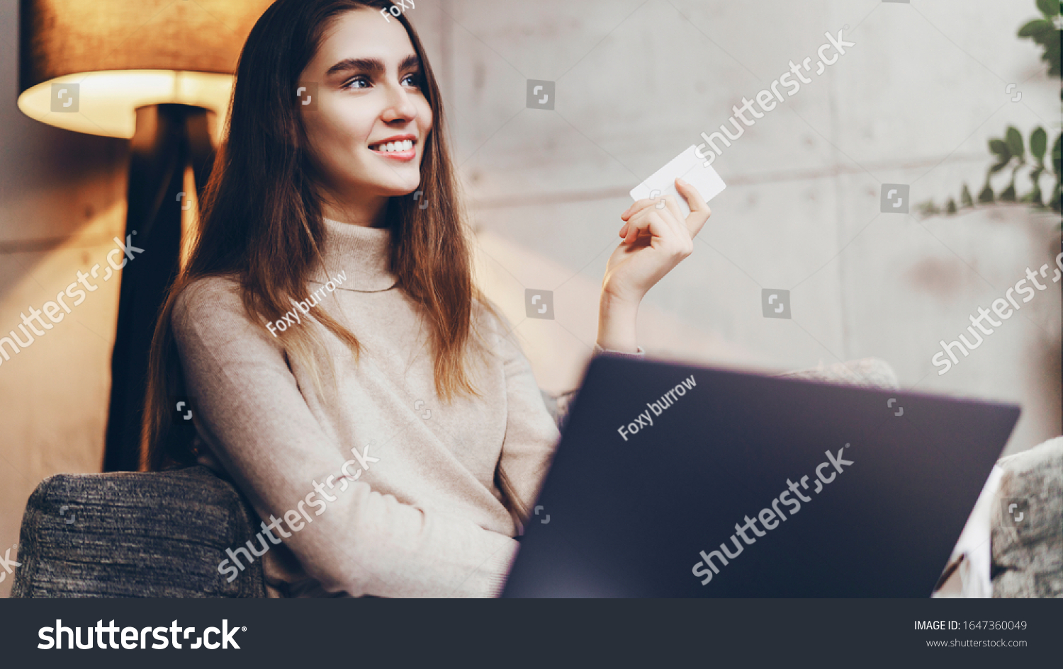 Girl using bank card for buying things online. Retail stores offering bonus cards for customers. Select items in web shop app, transfer money safely using sms code for payment. Money refund guarantee. #1647360049