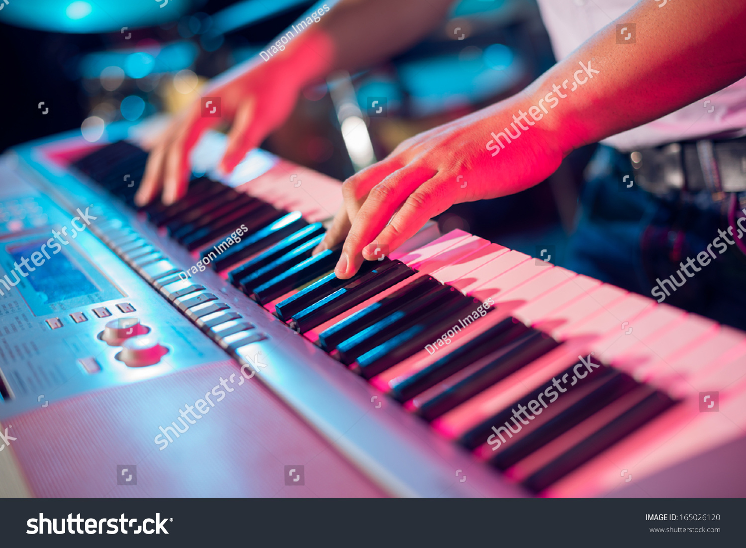 Human hands playing the piano on the party #165026120