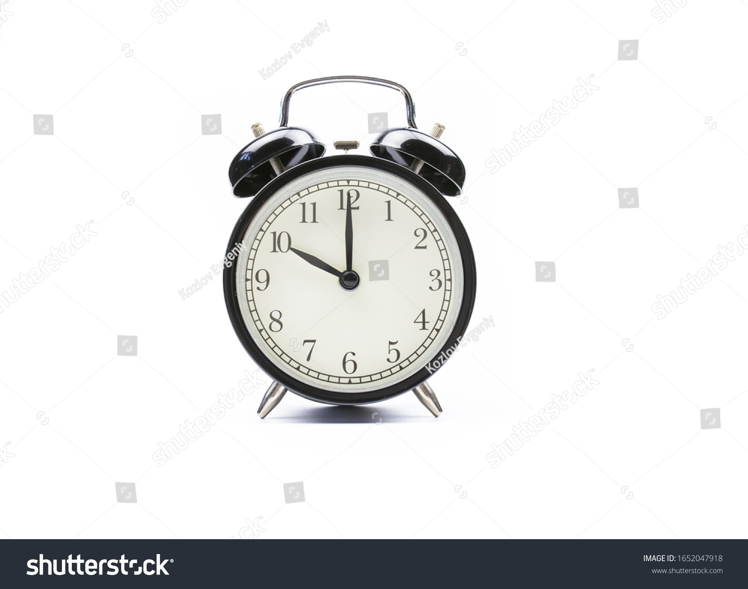Black vintage alarm clock on a white background shows the time ten hours #1652047918