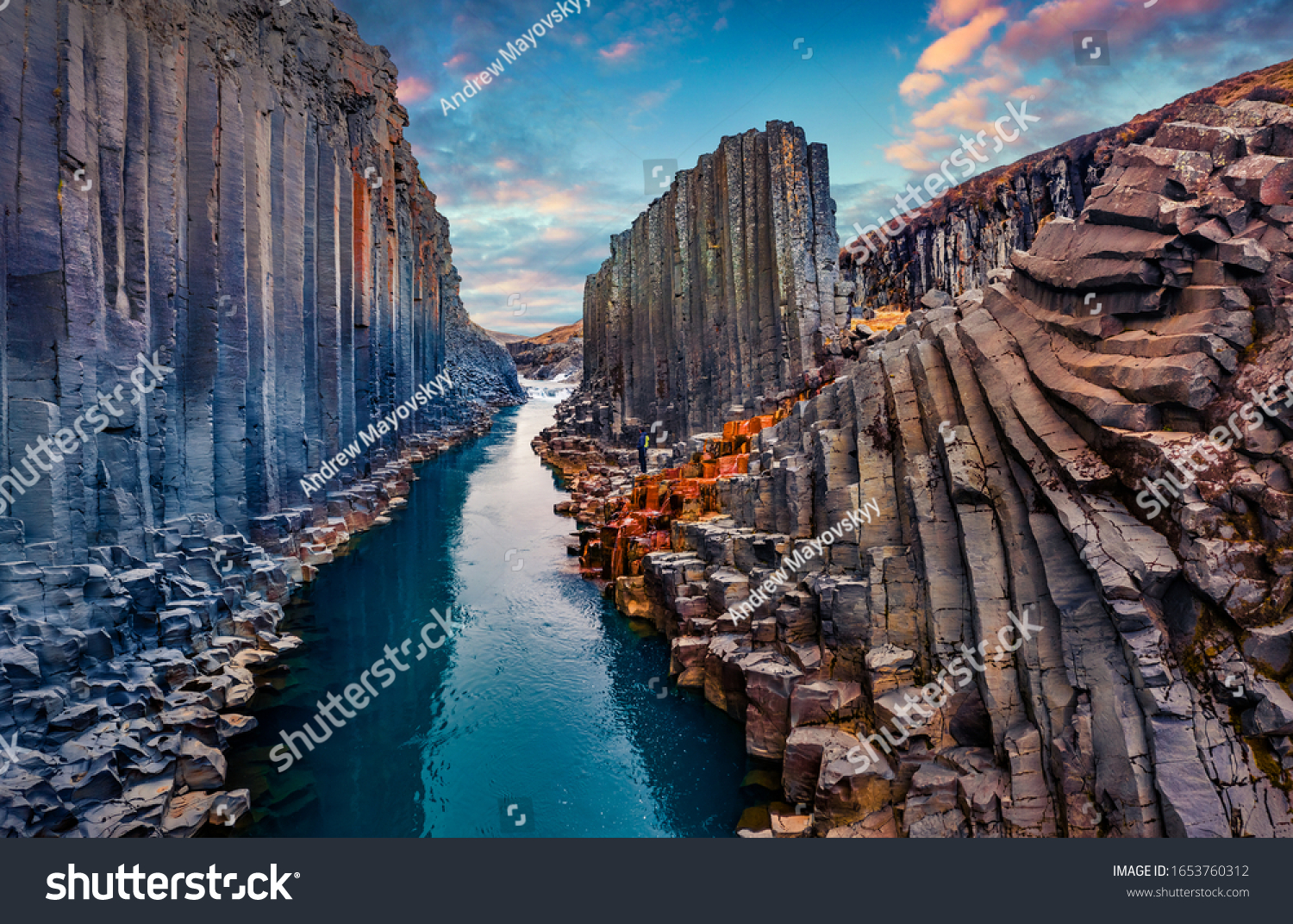Fantastic summer sunset on Studlagil Canyon. Incredible evening view ofJokulsa A Bru river. Superb outdoor scene of Iceland, Europe. Beauty of nature concept background. #1653760312