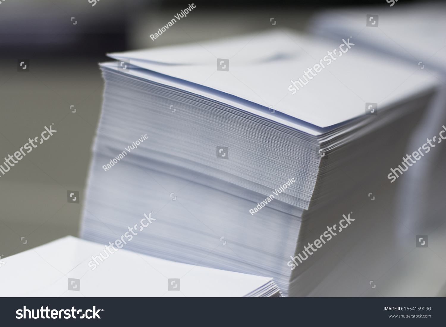 a pile of paper envelopes in printing office #1654159090