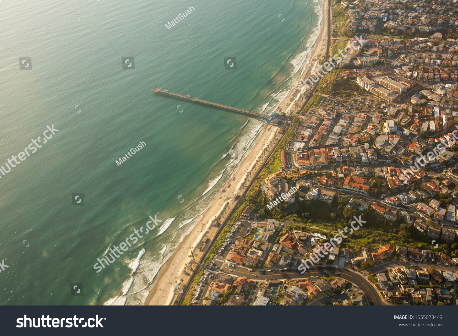 Aerial view of the San Clemente, California skyline featuring the San Clemente Pier. #1655078449