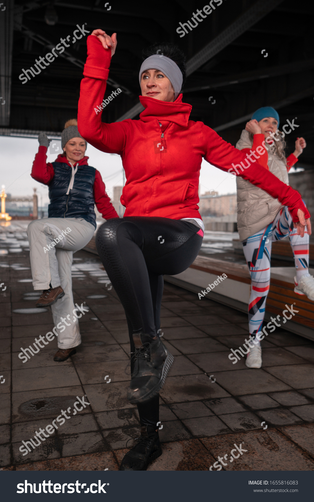 Middle Aged Women Exercising Outdoors In Winter Time. Living Full Life At Senior Age. Diversity and Equity. Beauty In Age  #1655816083