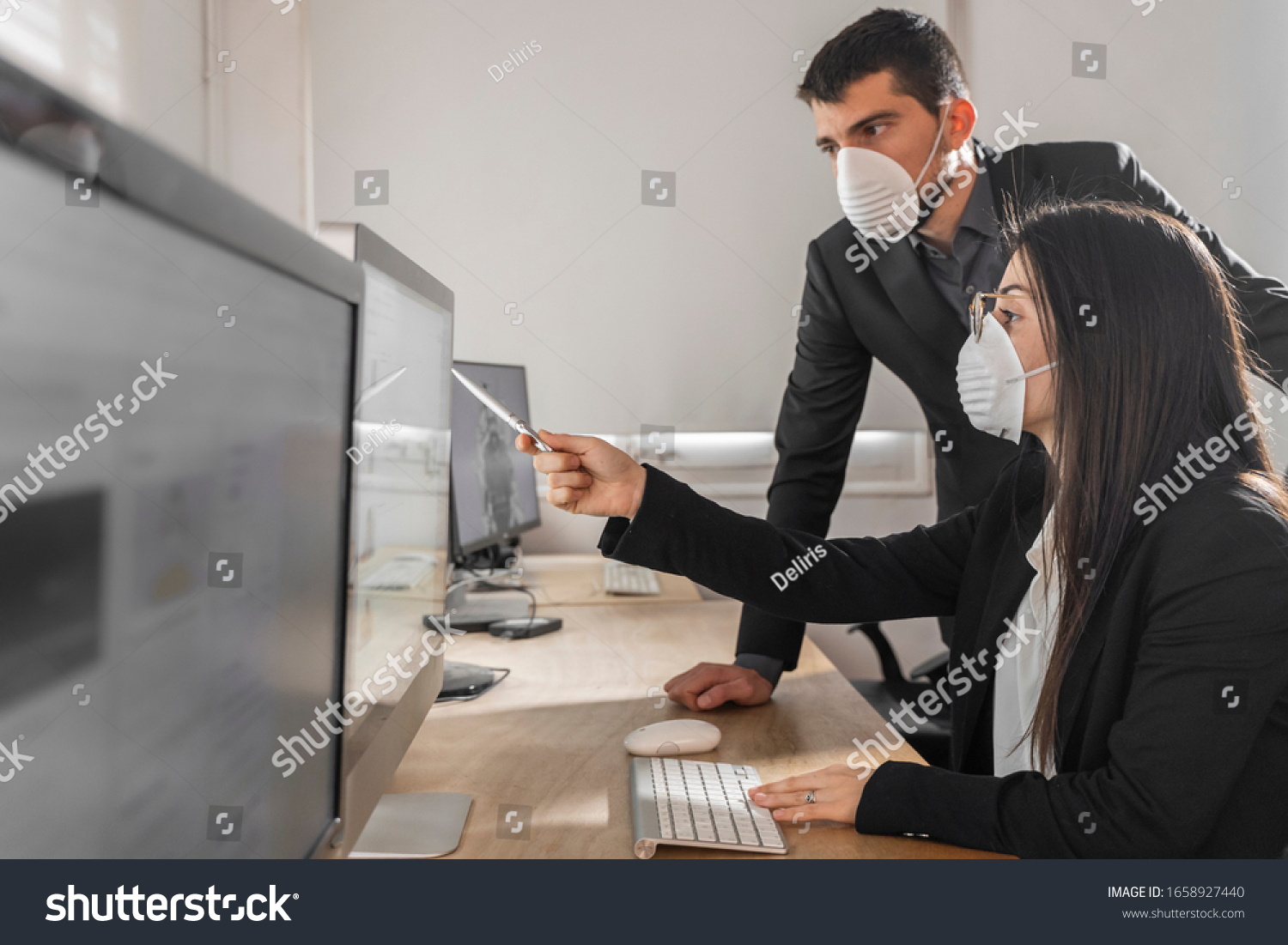 Coronavirus Office workers with mask for corona virus. Business workers wear masks to protect and take care of their health. Office working with computer. Working from home.  #1658927440