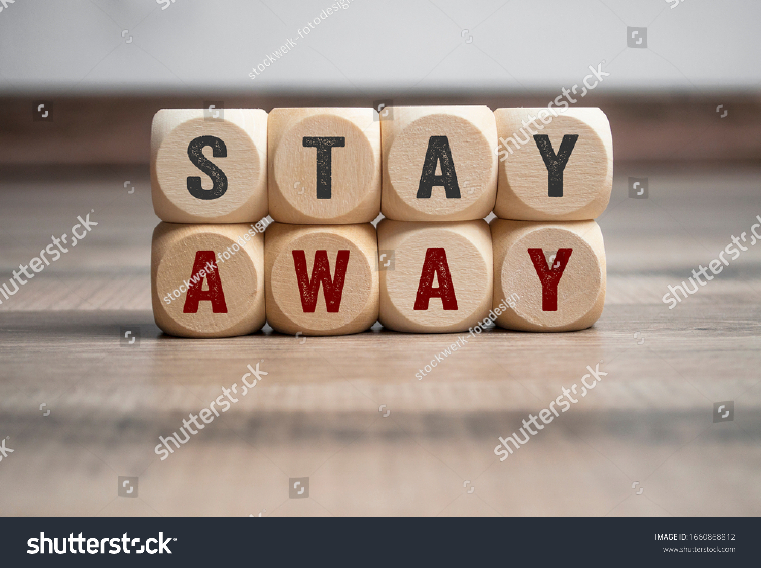 Cubes and dice with Stay Away on wooden background #1660868812
