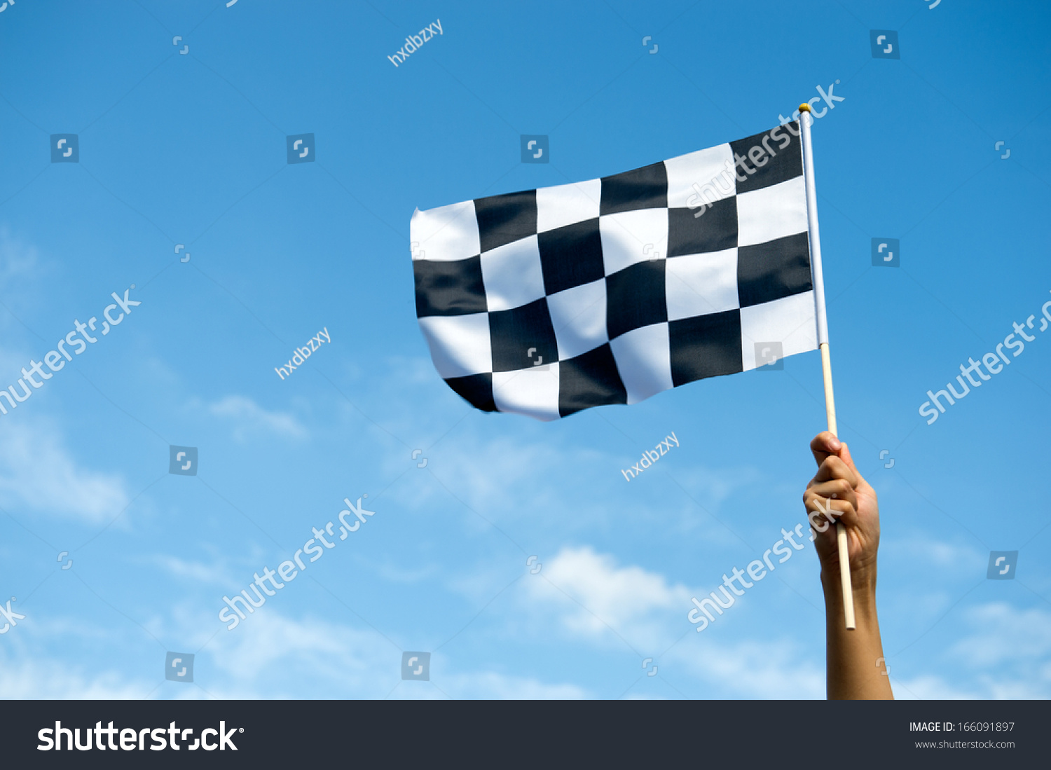 checkered race flag in hand. #166091897
