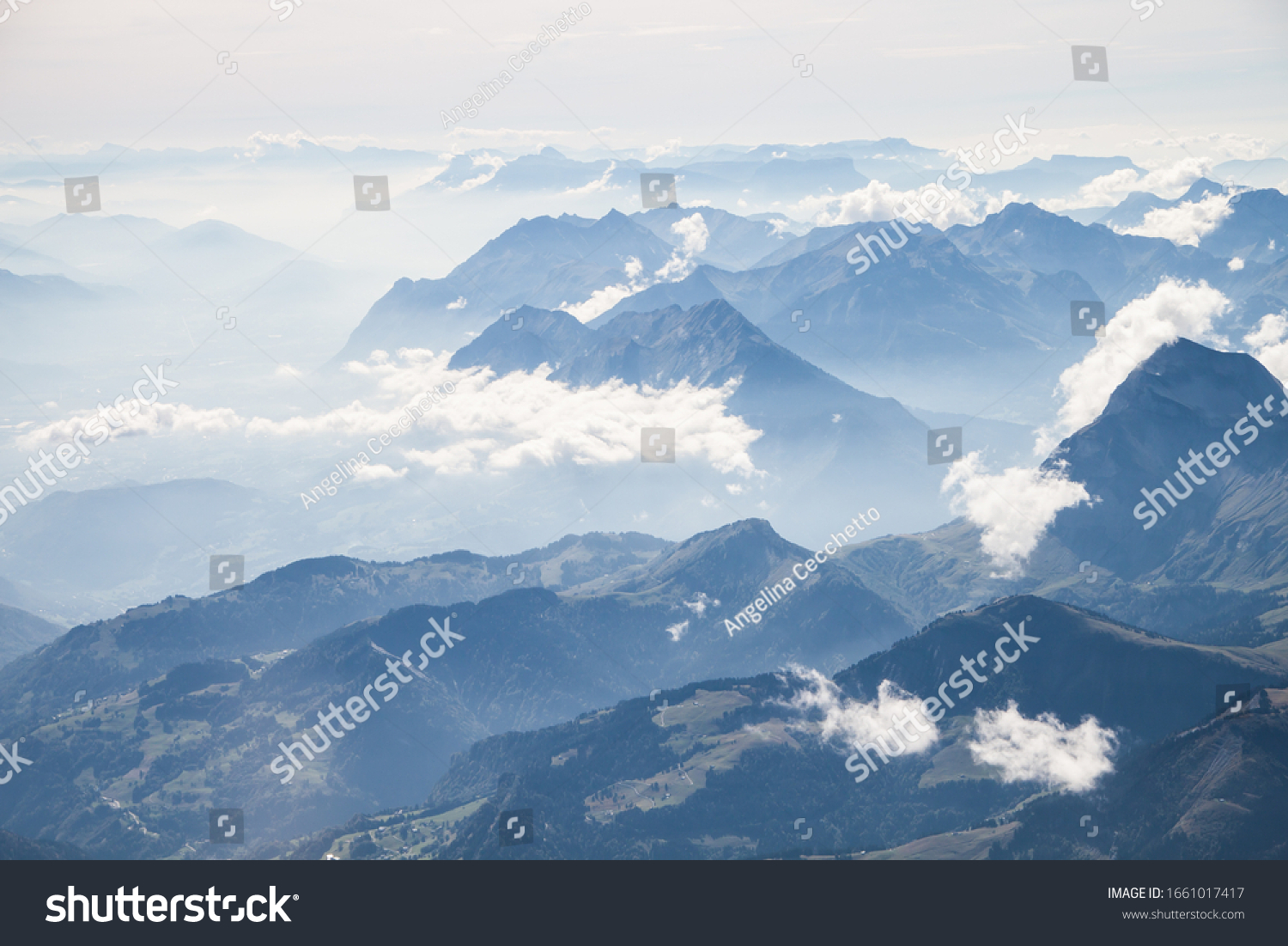 Altitude View over the Alps Moutains Chain from a Twoseater Plane #1661017417