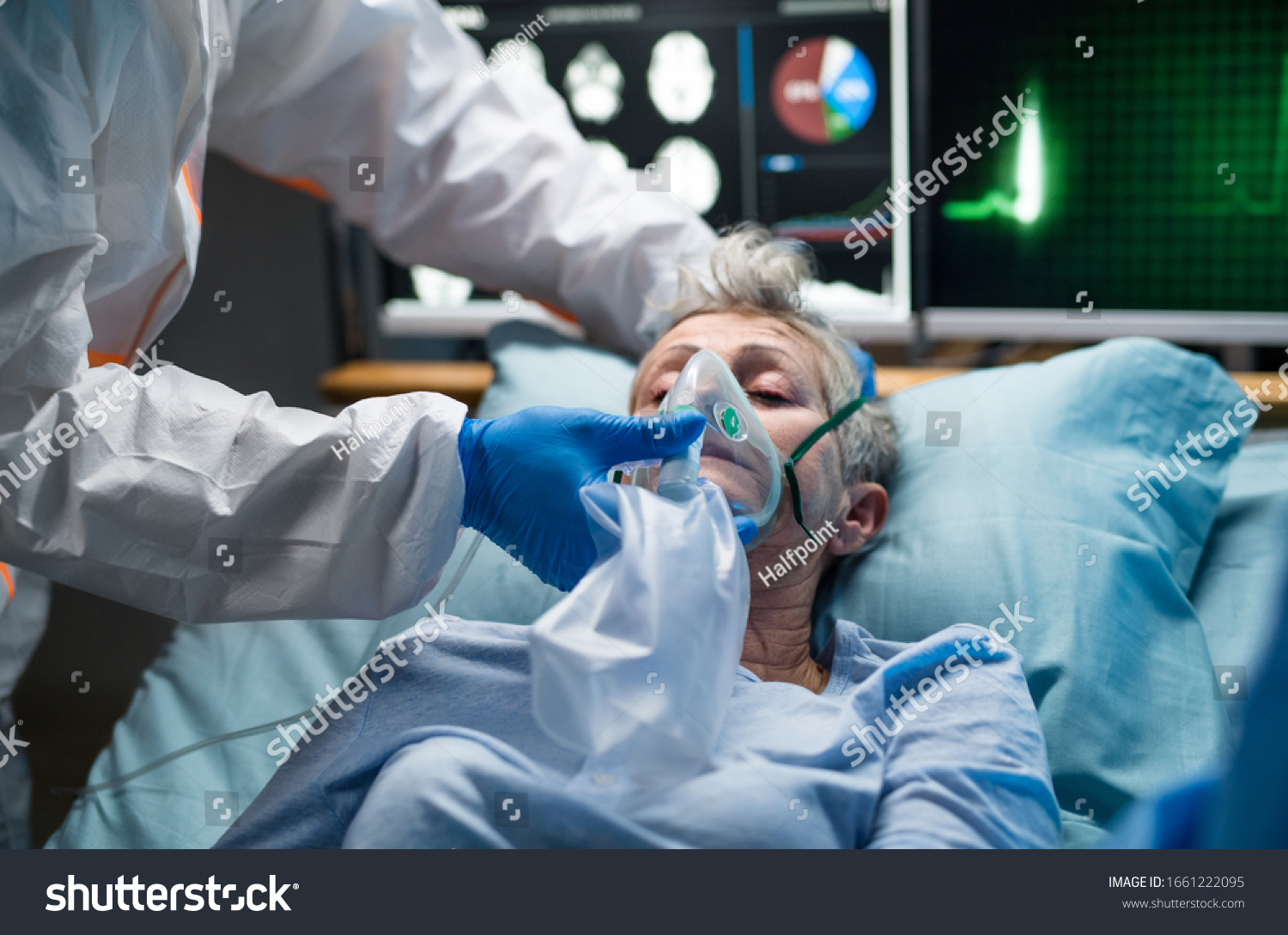Infected patient in quarantine lying in bed in hospital, coronavirus concept. #1661222095