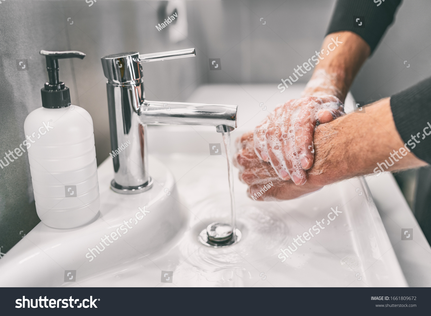 Washing hands rubbing with soap man for corona virus prevention, hygiene to stop spreading coronavirus. #1661809672