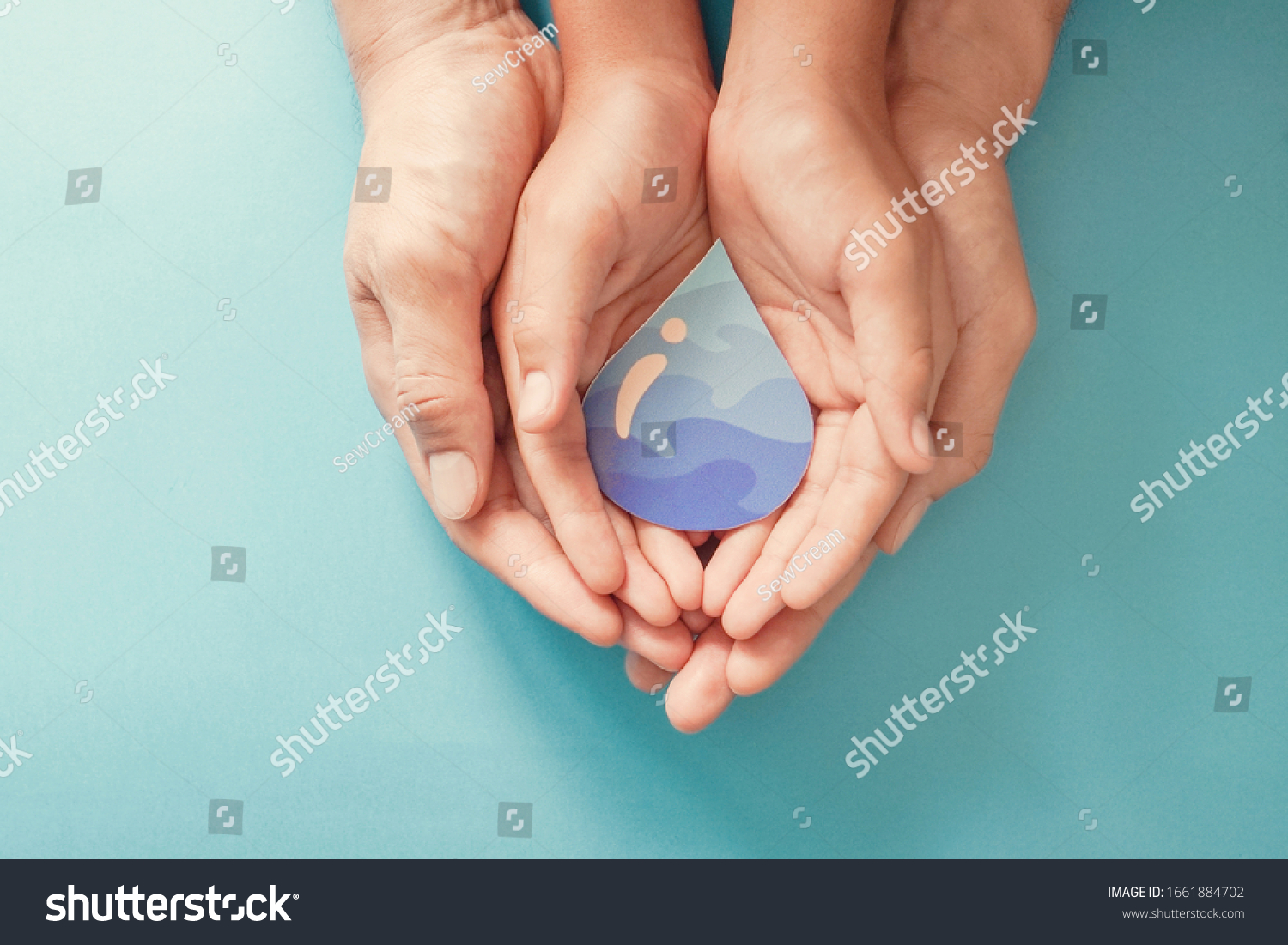 Hands holding water drop,world water day,clean water and sanitation, hand sanitizer and hygiene for covid pandemic, vaccine,family washing hands, CSR, save water, clean renewable energy concept  #1661884702