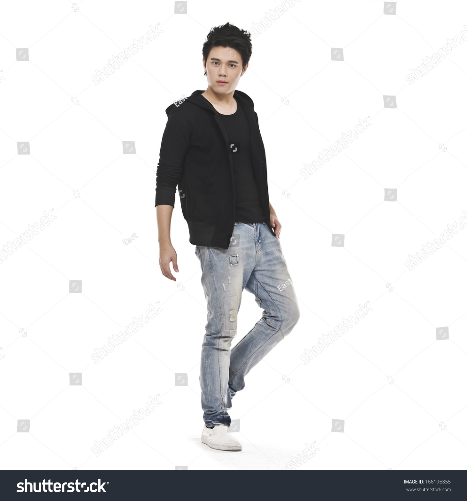 Full length casual young man in jeans standing on white #166196855