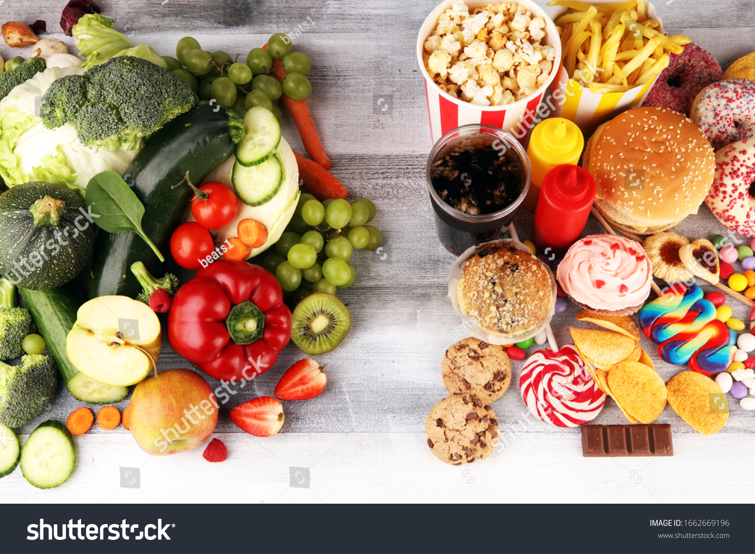 healthy or unhealthy food. Concept photo of healthy and unhealthy food. Fruits and vegetables vs donuts,sweets and burgers on table #1662669196
