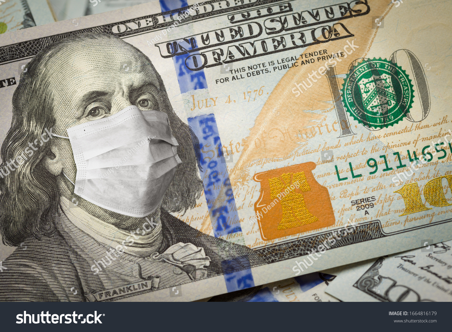 One Hundred Dollar Bill With Medical Face Mask on Benjamin Franklin. #1664816179