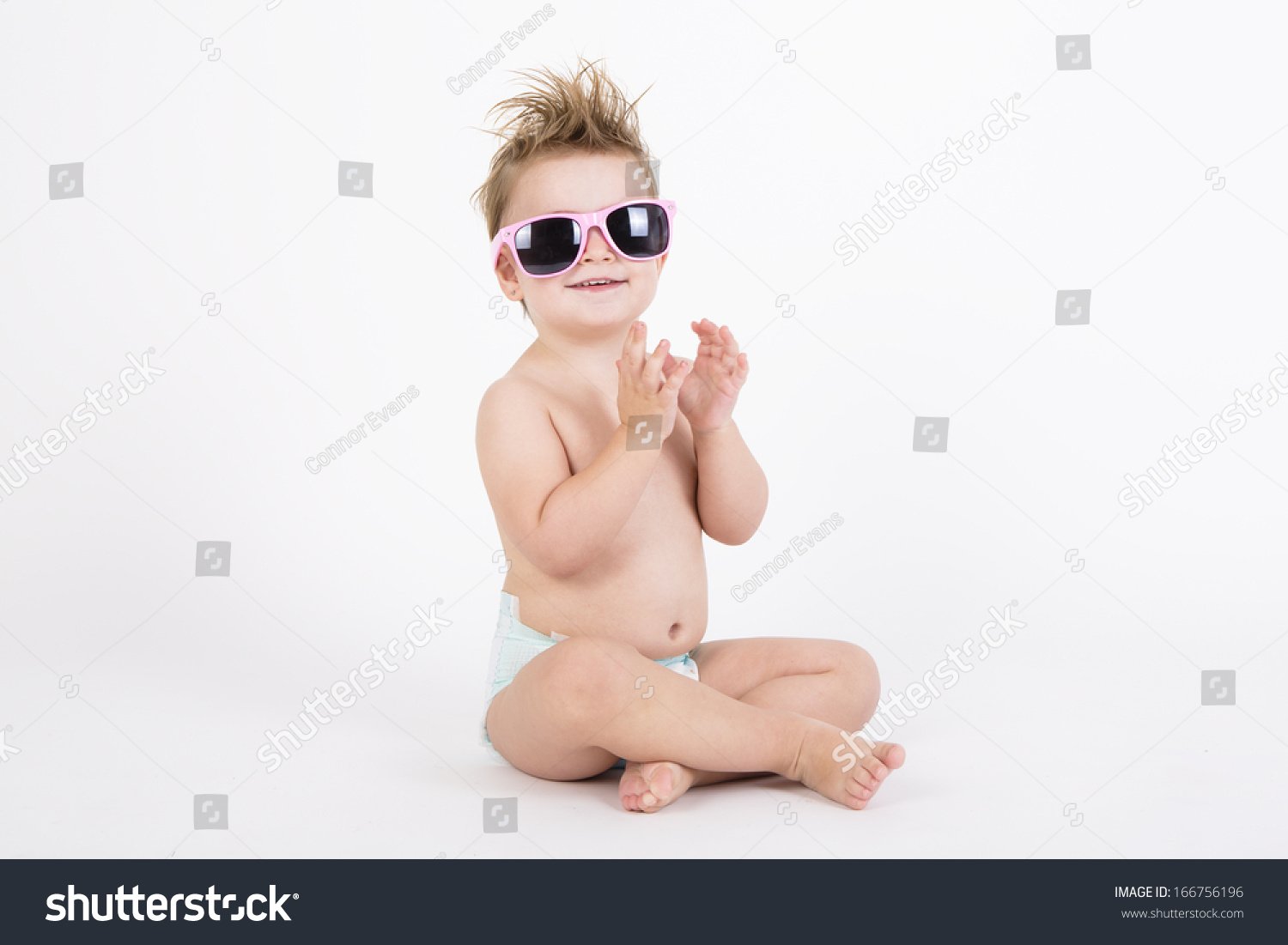 disheveled girl smiling wearing sunglasses with withe background #166756196