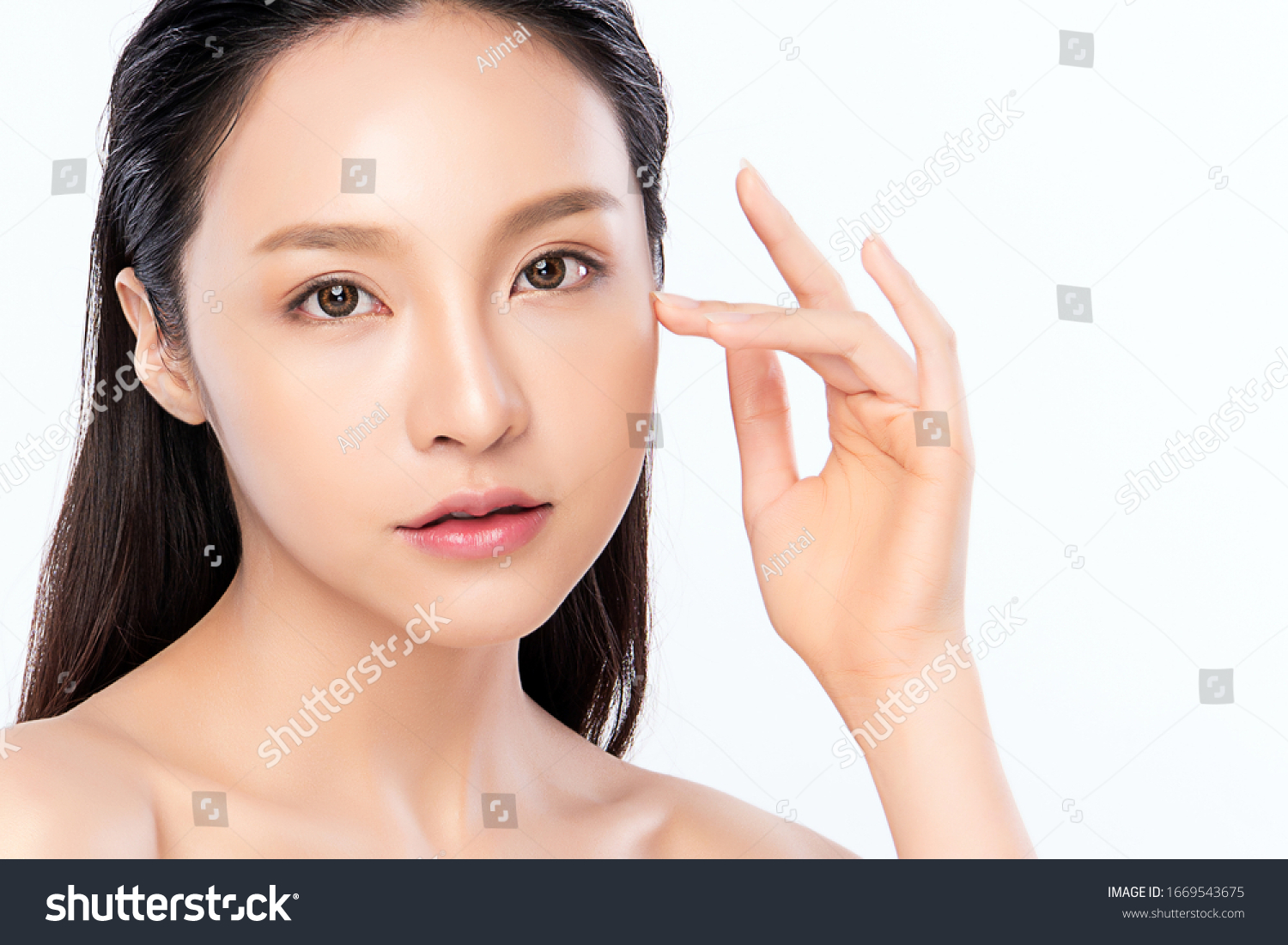 Beautiful Young Asian Woman with Clean Fresh Skin. Face care, Facial treatment, Cosmetology, beauty and healthy skin and cosmetic concept .woman beauty skin isolated on white background. #1669543675