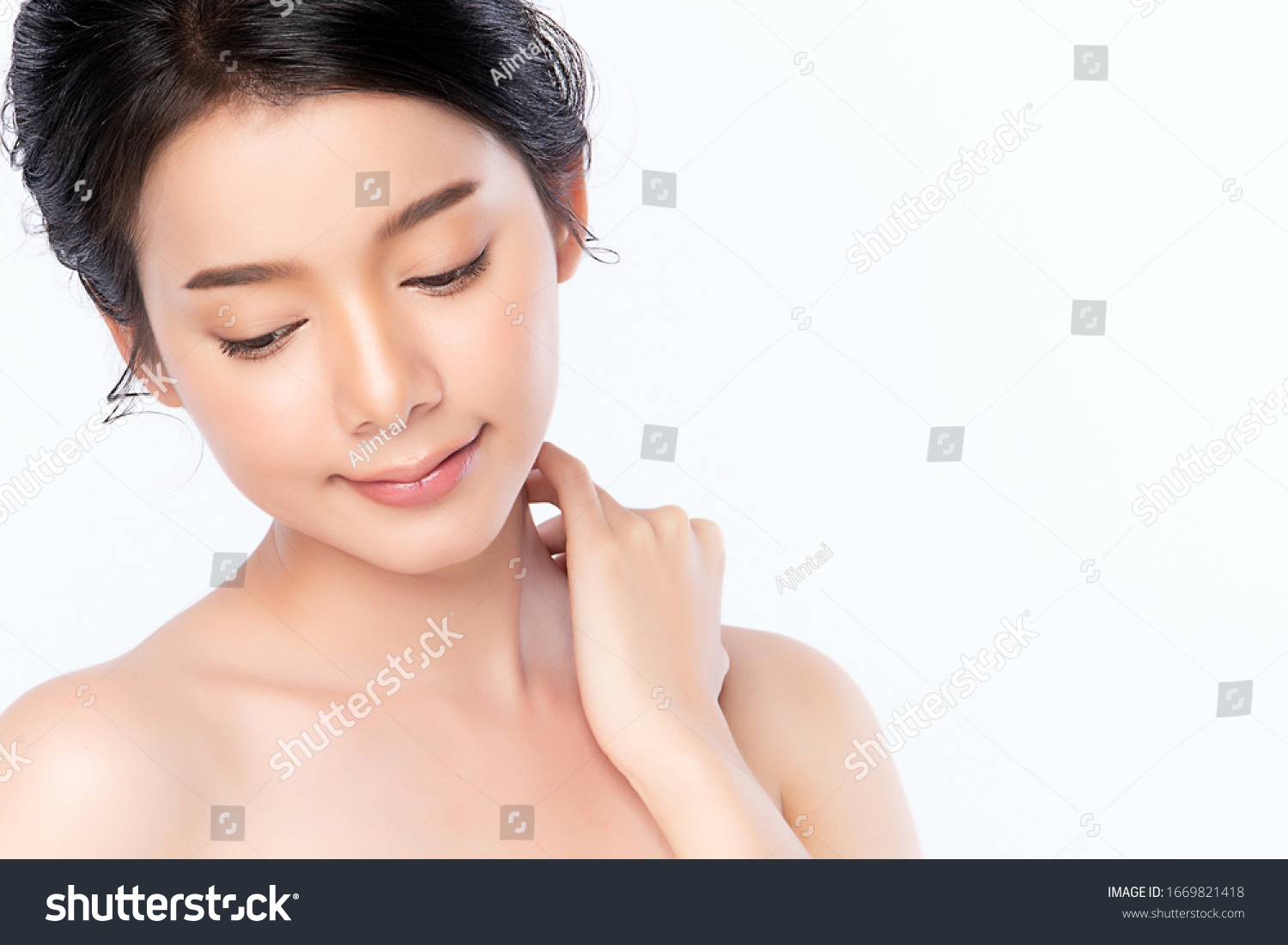 Beautiful Young Asian Woman with Clean Fresh Skin. Face care, Facial treatment, Cosmetology, beauty and healthy skin and cosmetic concept .woman beauty skin isolated on white background. #1669821418