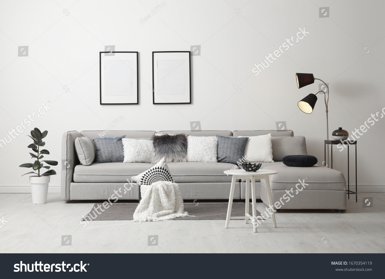 Stylish living room interior with comfortable sofa #1670354119