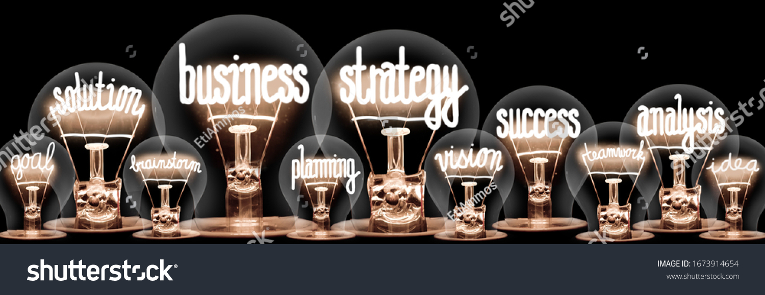 Photo of light bulbs with shining fibers in a shape of Business Strategy, Solution, Success, Analysis and Planning concept related words isolated on black background #1673914654