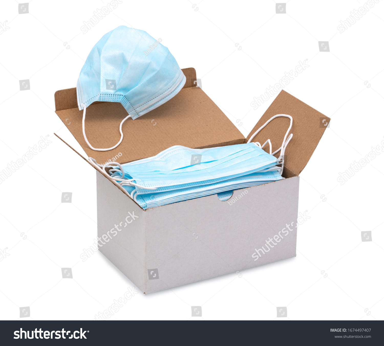 Blue ear loop surgical face masks in a box isolated on white background with clipping (vector) path. Disposable procedural face mask with malleable nose clip. Protective mask with elastic ear bands. #1674497407