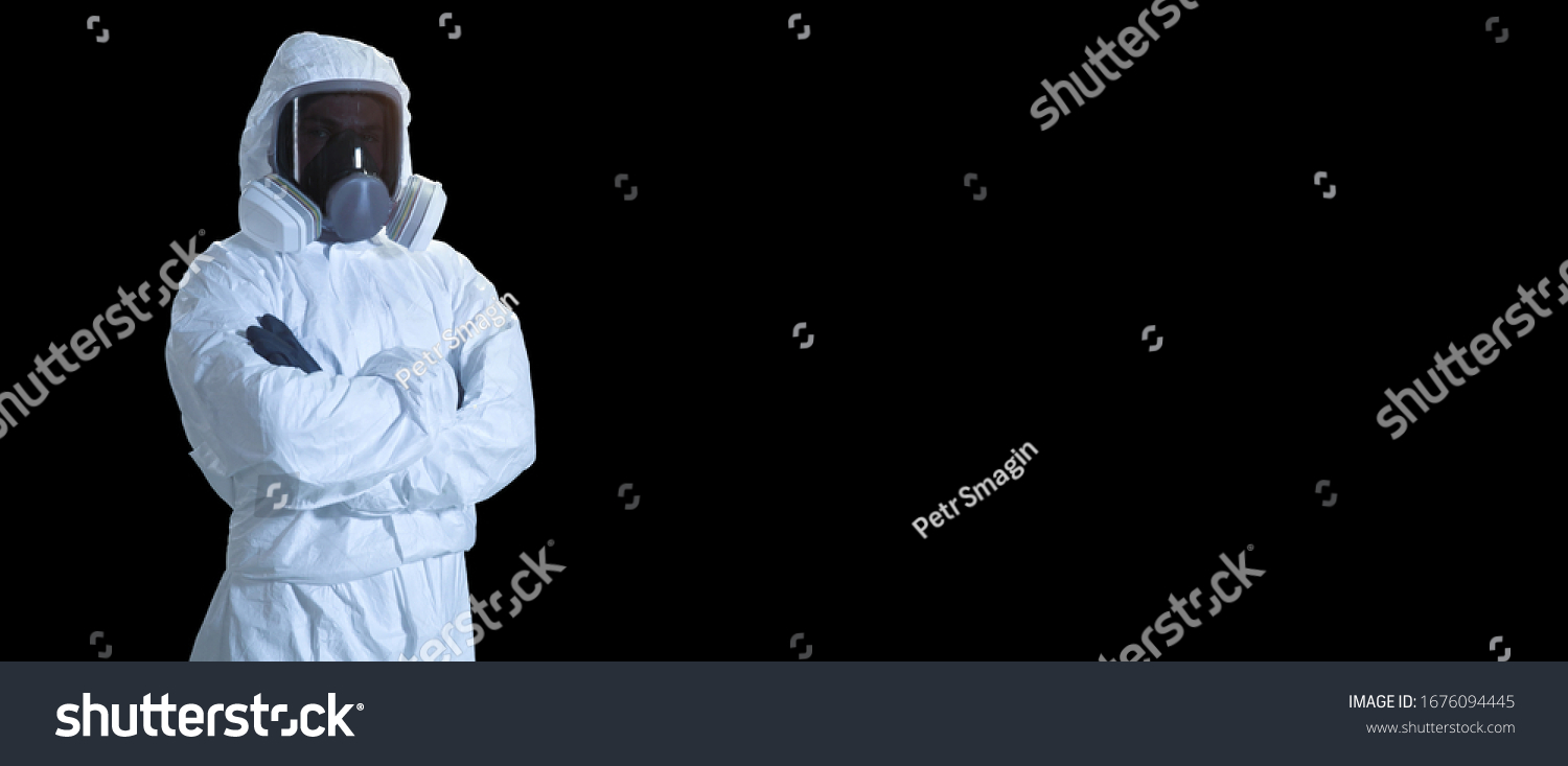 scientist in coronavirus protection suit. man in a protective suit and mask.  paramedic in full biosecurity suit isolated on black background. doctor in personal protective equipment suit #1676094445