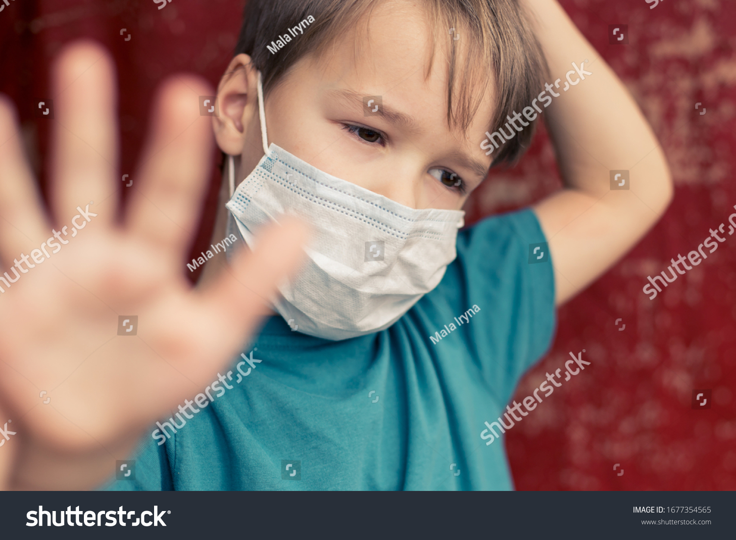 Portrait of Toddler kid wearing medical mask.A boy wearing mouth mask against pandemic. Concept of coronavirus quarantine or covid-19.Protection against virus and infection control concept. #1677354565