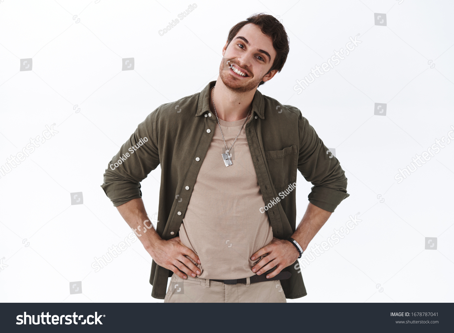 Handsome happy boyfriend tilt head and looking pleased camera, satisfied shopping with girlfriend at mall, checking-out outfit, agree with good choice, standing delighted white background #1678787041
