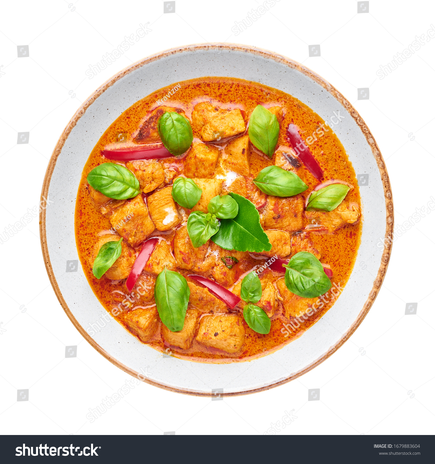 Thai Panang Chicken Curry isolated on white background. Phanaeng Curry is thai cuisine dish with chicken, kaffir lime leaves, red curry sauce and vegetables. Thai food. Thailand meal #1679883604