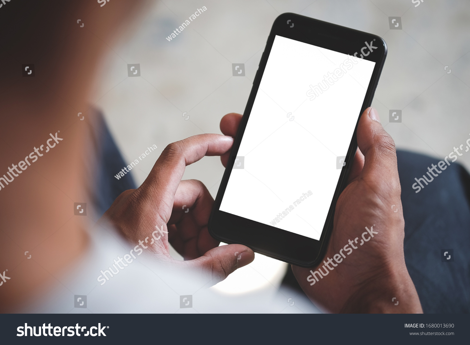 Cropped shot view of man hands holding smart phone with blank copy space screen for your text message or information content, female reading text message on cell telephone during in urban setting. #1680013690