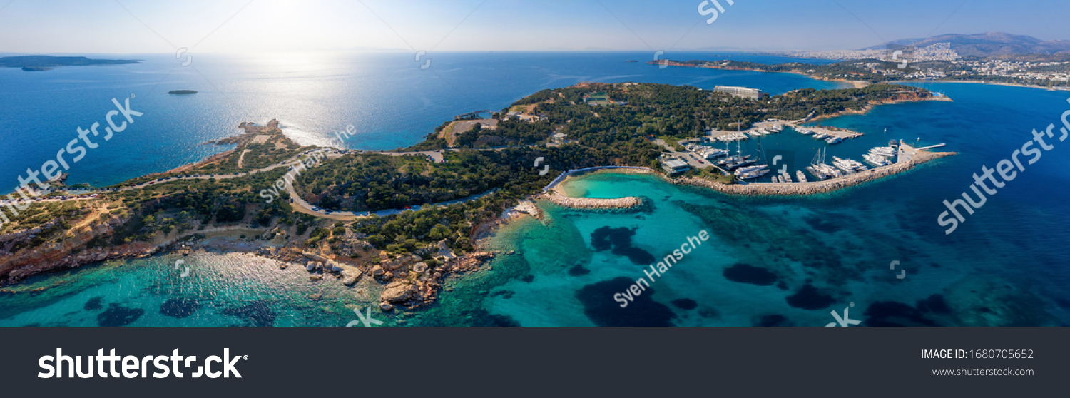 Panoramic aerial view to the Lemos area at Vouliagmenis district, south Athens riviera with beaches, yacht marinas and hotels, Greece #1680705652