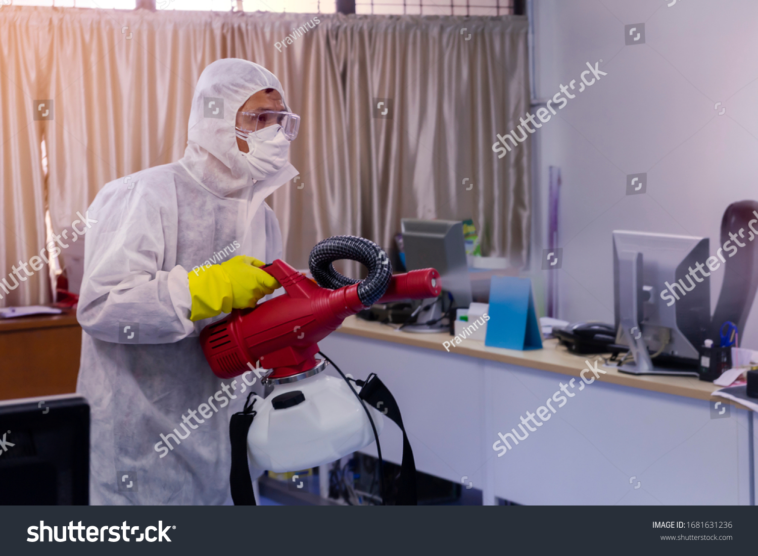 Disinfecting spray anti Corona virus in business office as a prevention against Coronavirus disease 2019,COVID-19 #1681631236