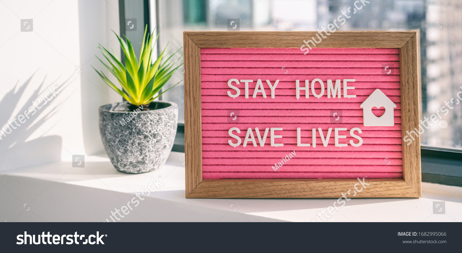 COVID-19 Coronavirus "STAY HOME SAVE LIVES" viral social media message sign with text for social distancing awareness. COVID-19 staying at home concept. Flatten the curve. #1682995066