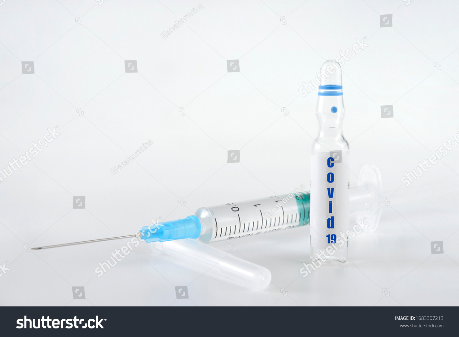 1 syringe with medicine and ampoule on a white background, medicine, epidemic, coronavirus, virus, covid 19 #1683307213