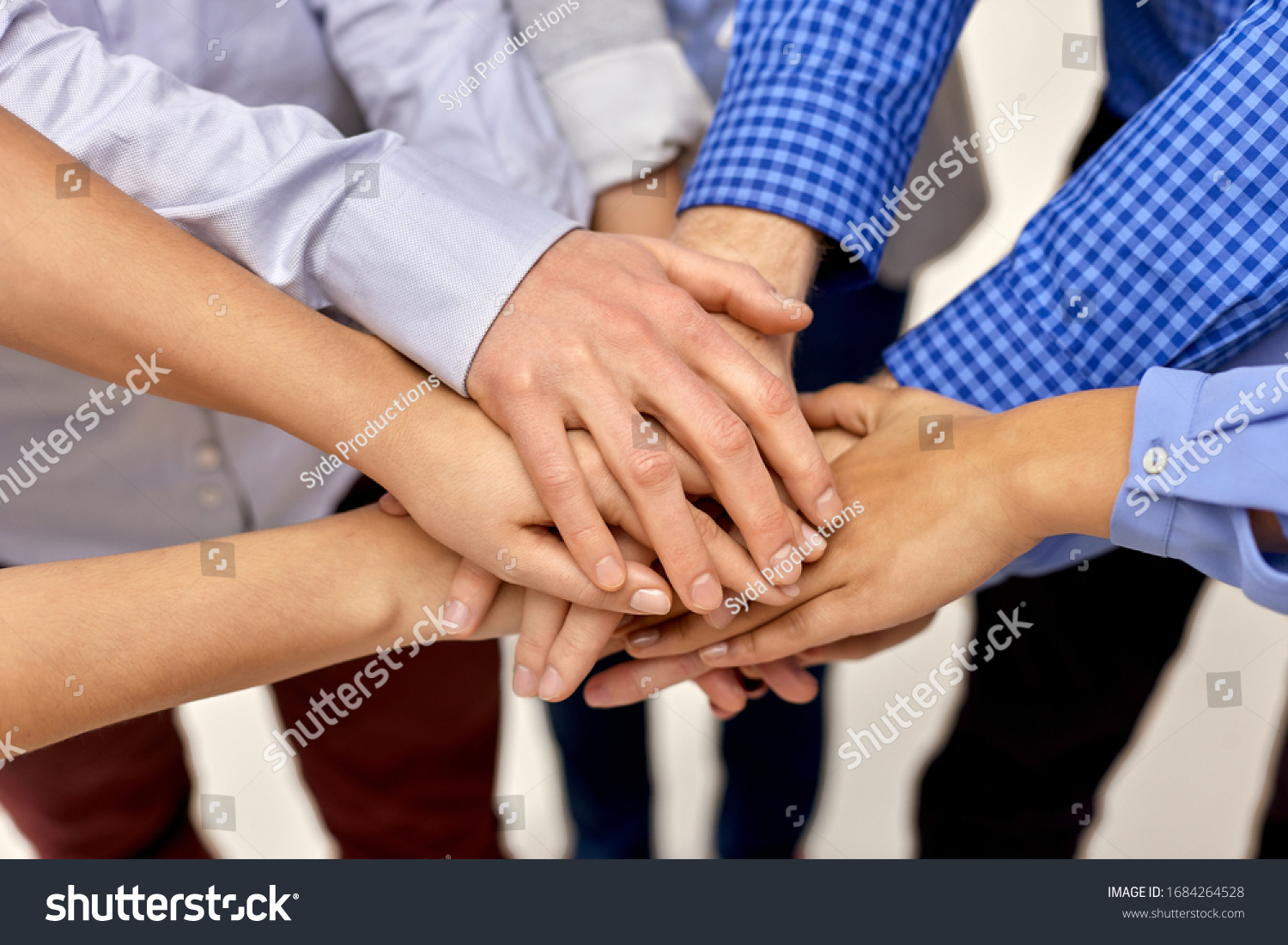 gesture, people and teamwork concept - close up of business team, friends or students stacking hands #1684264528