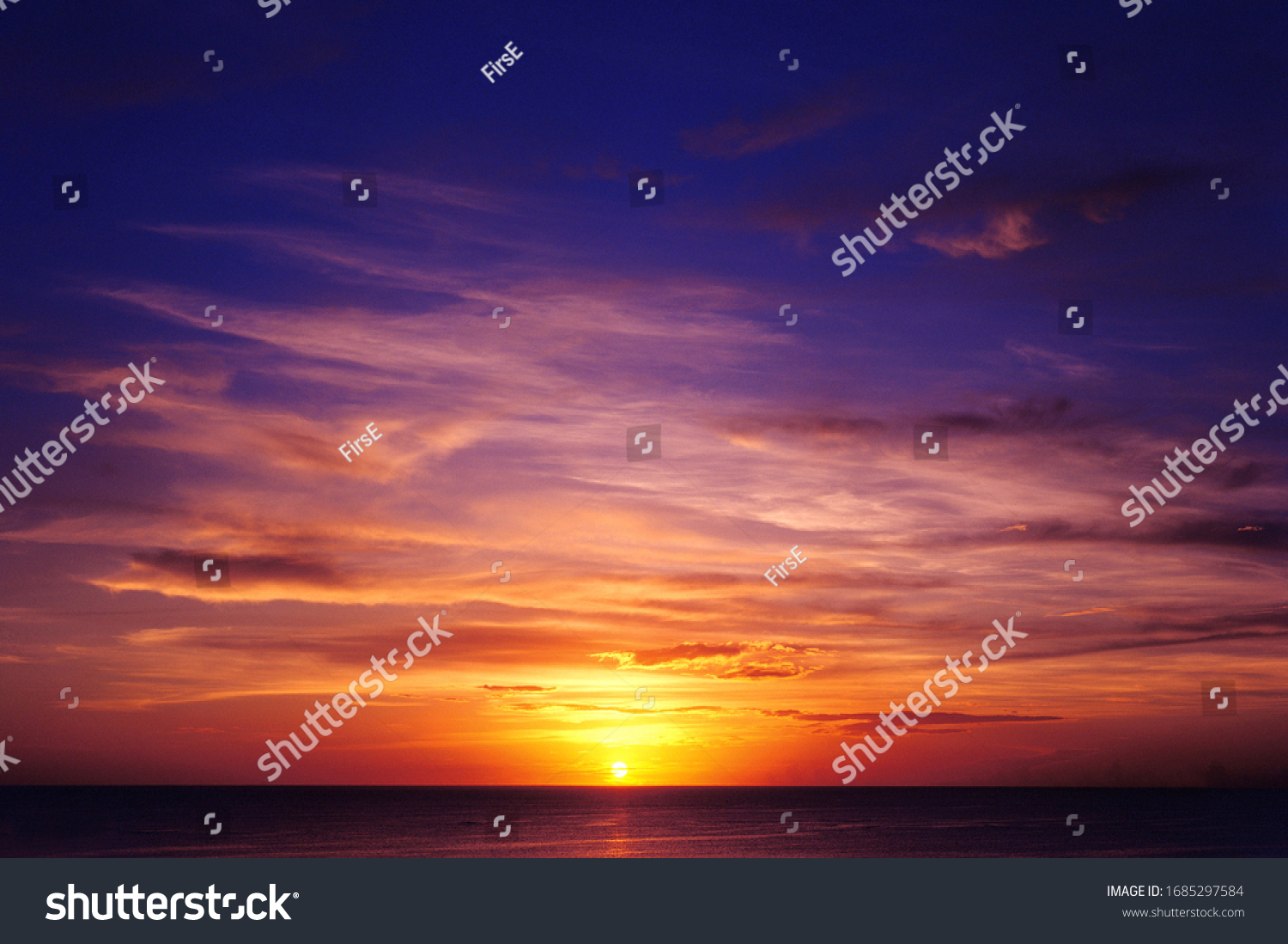 Tropical sea sunset. Sky background
 #1685297584