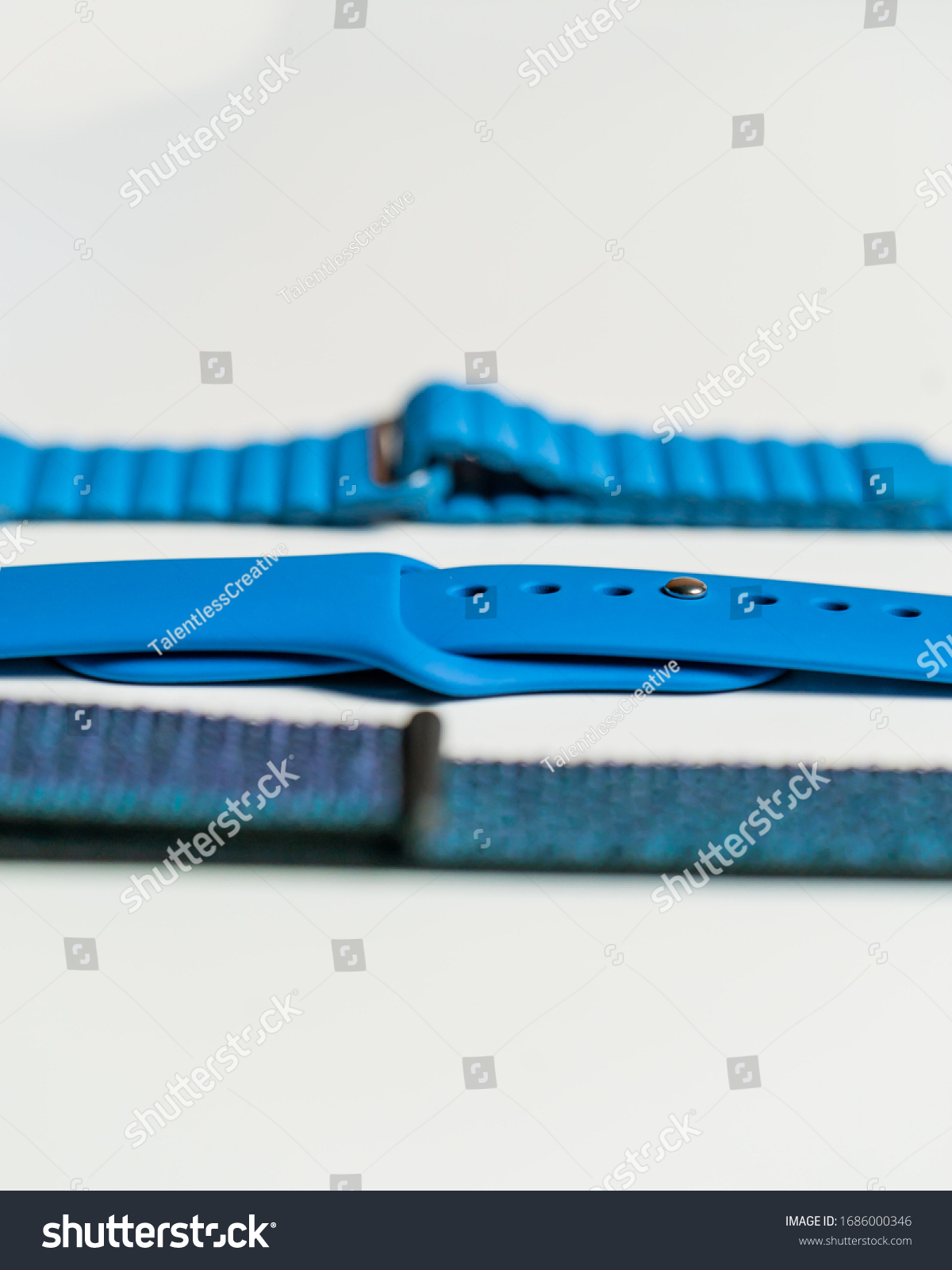 Los Angeles, California / USA - April 6 2019: Styled minimalistic photo of blue Apple Watch bands #1686000346