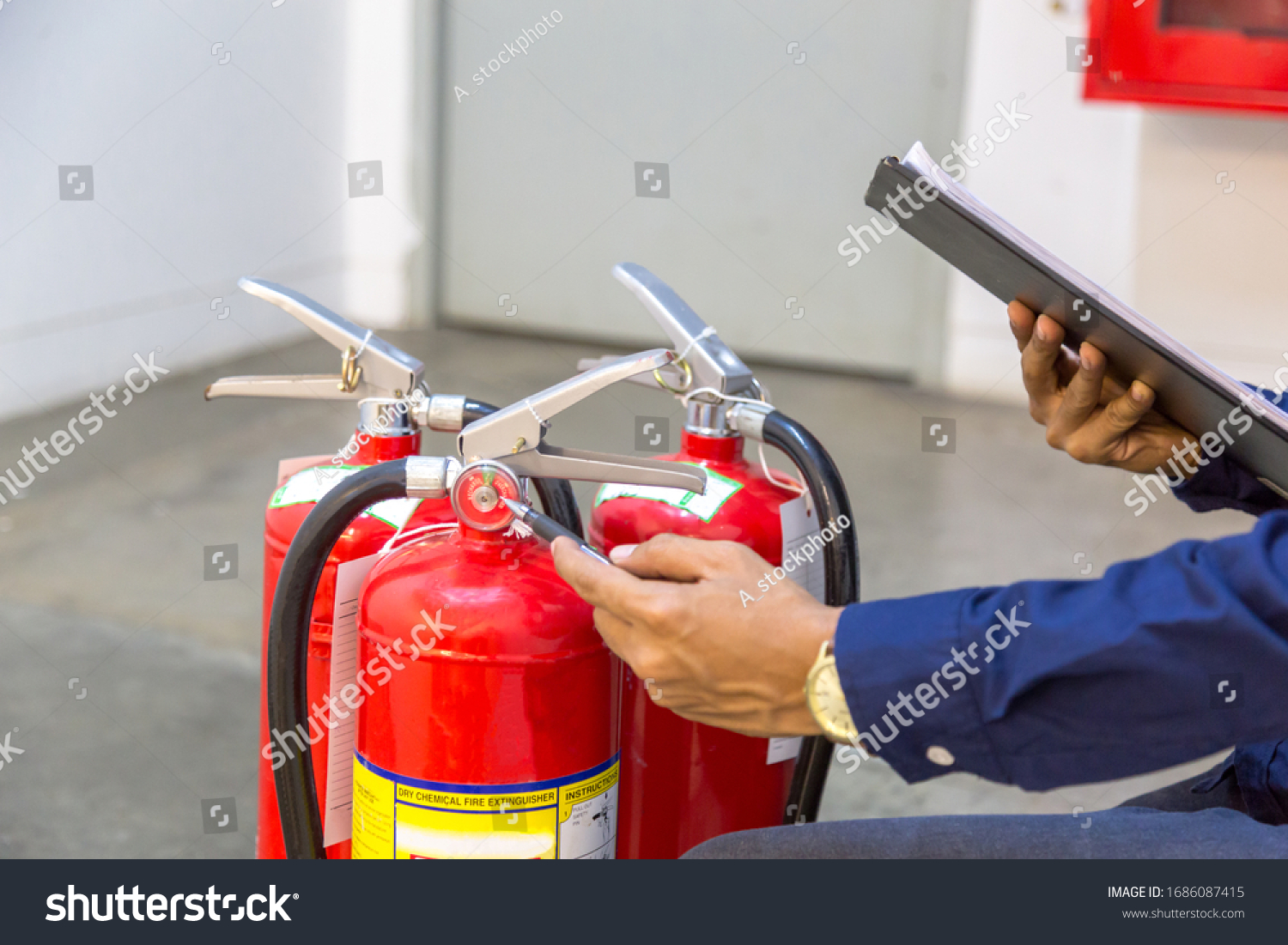 Engineer checking Industrial fire control system,Fire Alarm controller, Fire notifier, Anti fire.System ready In the event of a fire. #1686087415