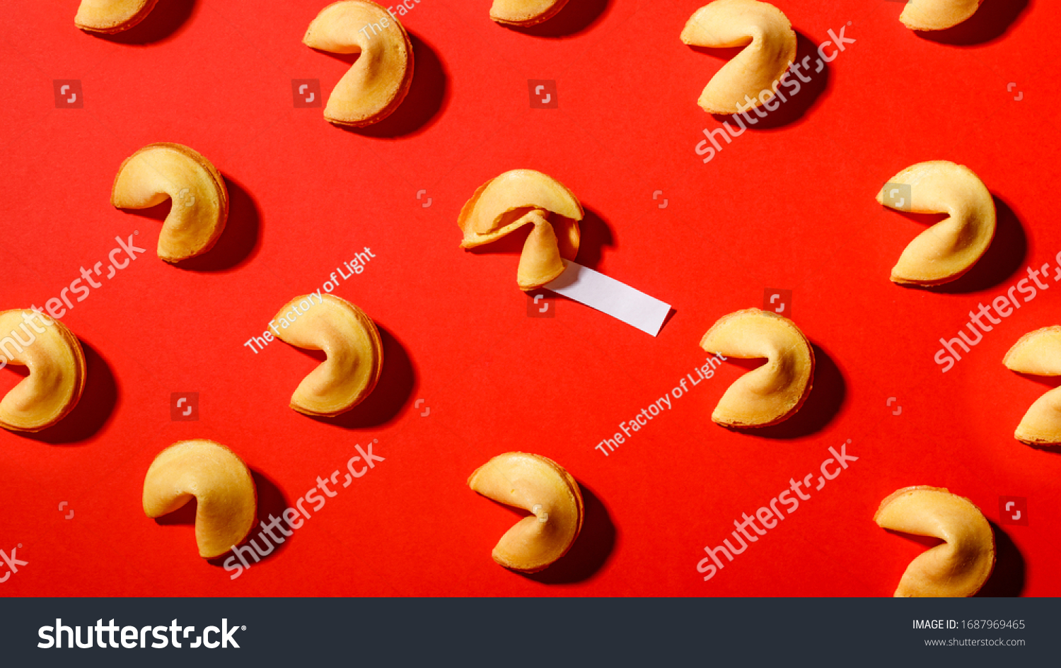 Fortune cookies on a red background, close-up.Сookies with prediction, pattern. #1687969465