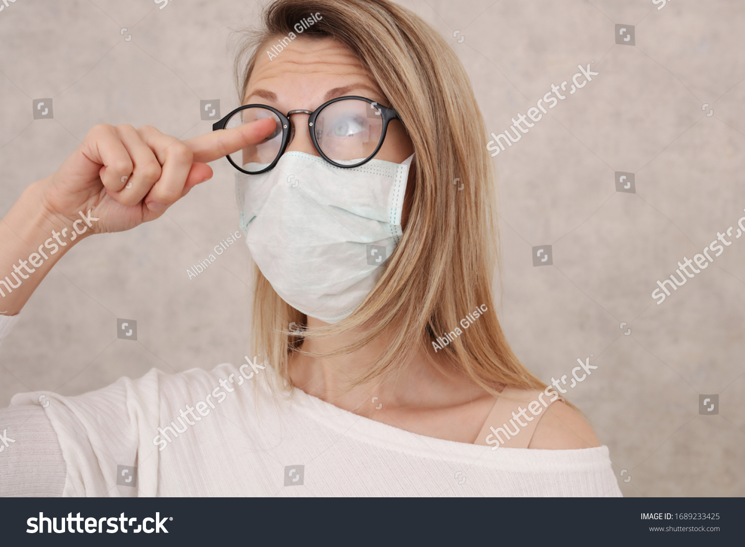 Medical mask and Glasses fogging. Avoid face touching, Coronavirus prevention, Protection. #1689233425