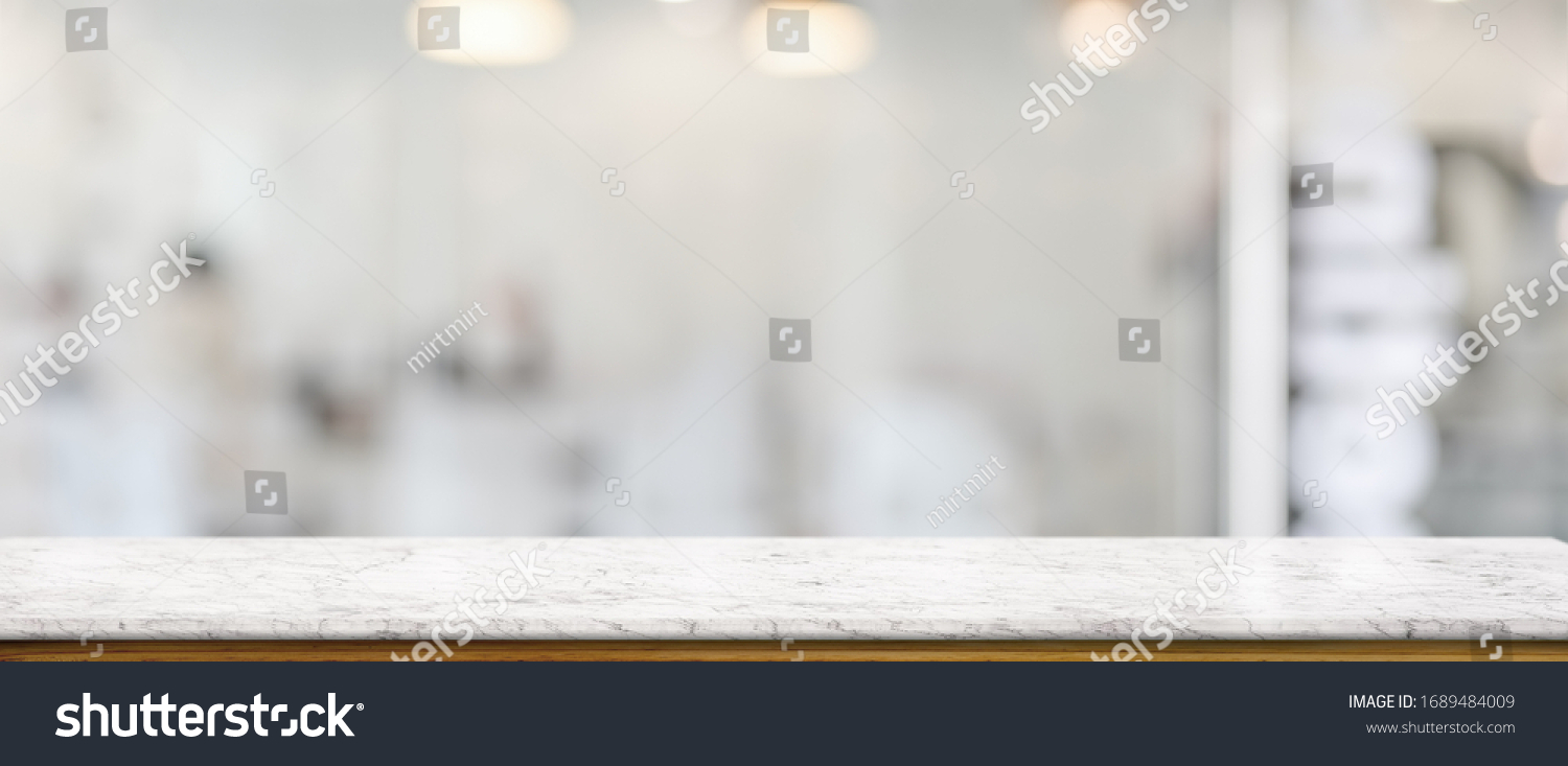Close up view of empty marble counter in glass partition  #1689484009