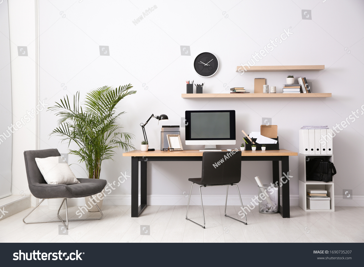 Modern computer on table in office interior. Stylish workplace #1690735207
