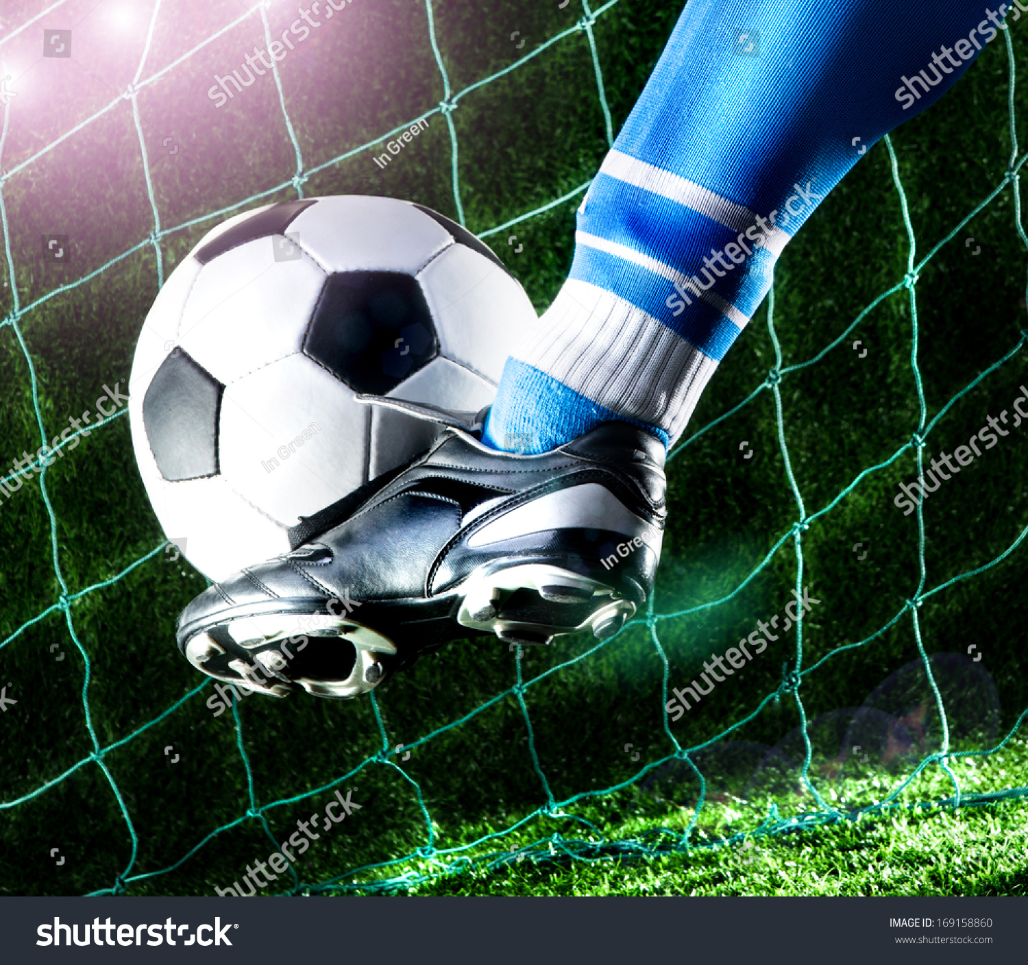 Foot Kicking Soccer Ball On Playing Field With Royalty Free Stock Photo Avopix Com