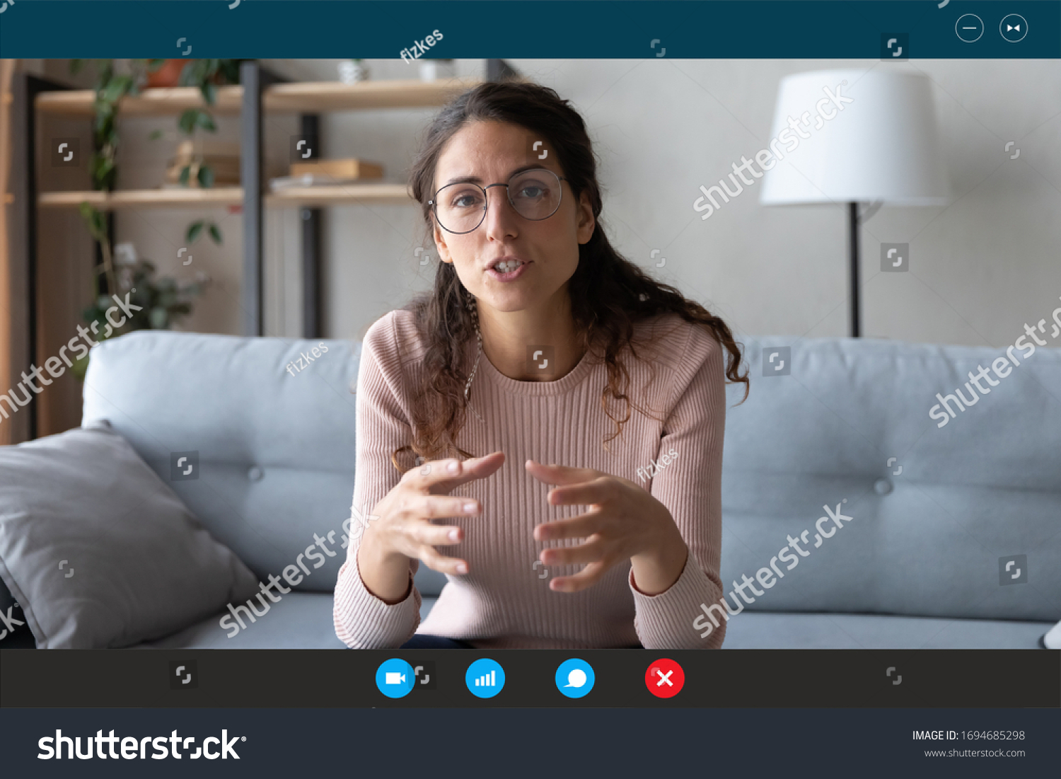 35s female teacher teach by video call explain educational material to trainee distantly seated on couch in living room at home. Friends communicating use videoconference app concept, pc screen view #1694685298