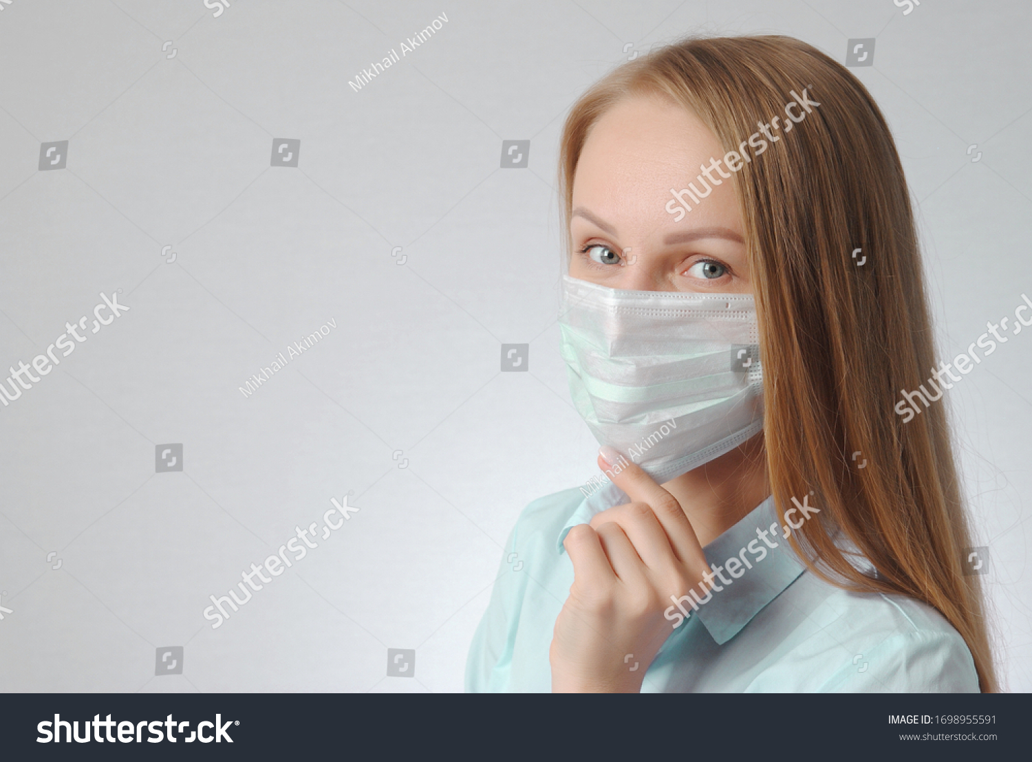 woman with medical mask. portrait of blonde girl. virus and health protection poster concept #1698955591