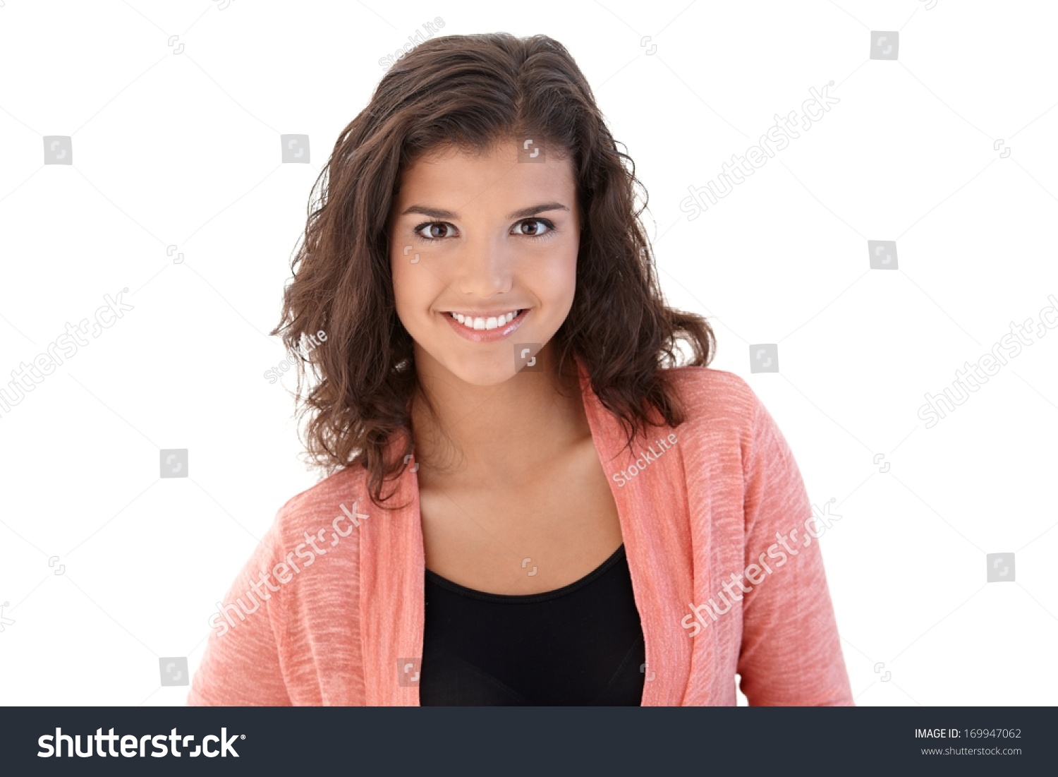 Portrait of smiling attractive schoolgirl, looking at camera. #169947062