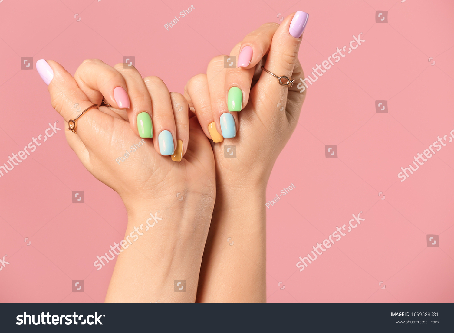 Hands of young woman with beautiful manicure on color background #1699588681