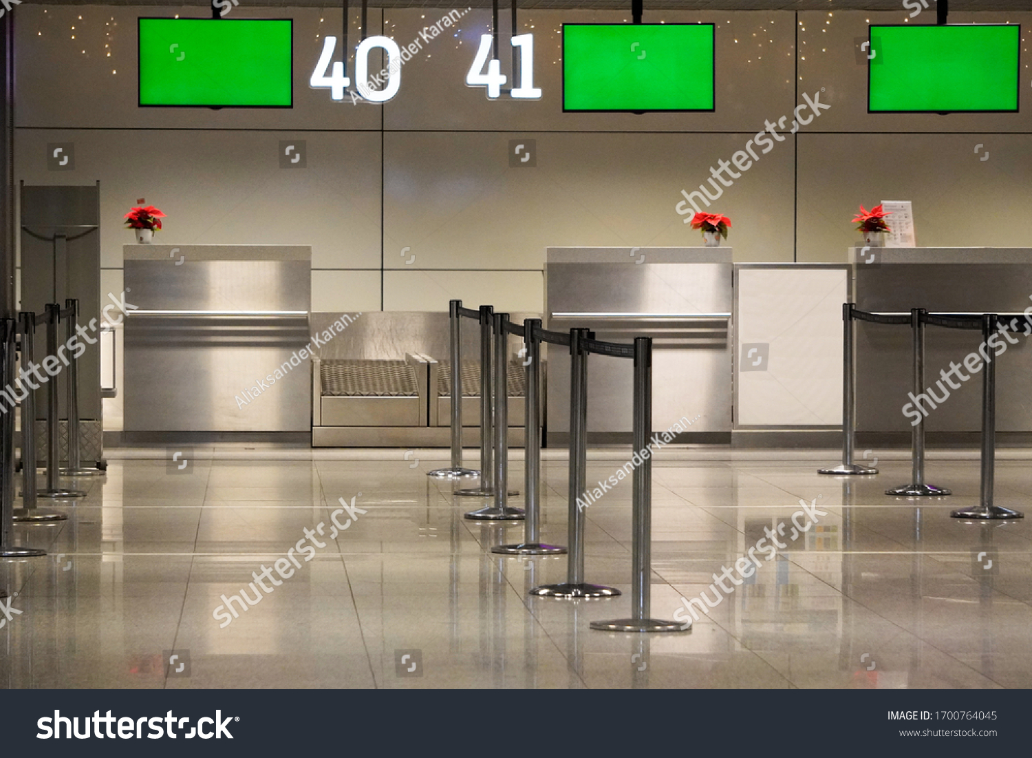 Empty airport. Empty international airport check-in counters during the COVID-19 coronavirus pandemic. No people. The private airport. Loss of civil aviation revenue. #1700764045