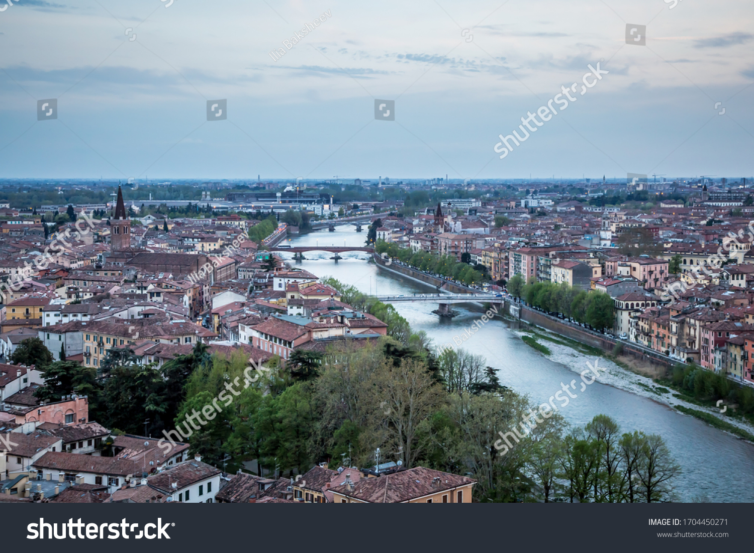 VERONA/ITALY - 3 APRIL 2017: View of the evening Verona from the observation deck at the Castle of St. Peter. Verona, Veneto, Italy #1704450271